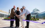 St. Paul Parks and Recreation Director Mike Hahm, Rep. Alice Hausman, Nancy Nelson and Greg McNeely cut the ribbon during a ceremony for the Centennia