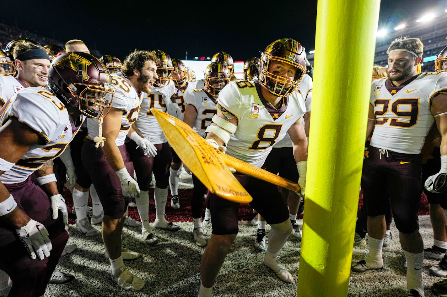 Gophers defensive lineman Thomas Rush celebrates with Paul Bunyan's Axe after Minnesota beat Wisconsin 23-16 Saturday