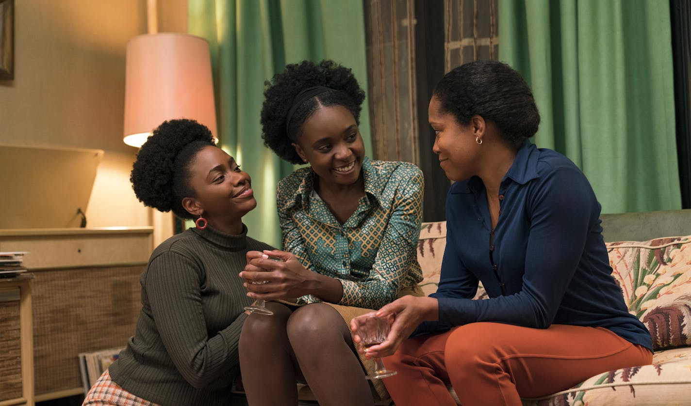 This image released by Annapurna Pictures shows Teyonah Parris, from left, KiKi Layne and Regina King in a scene from "If Beale Street Could Talk." (Tatum Mangus/Annapurna Pictures via AP)