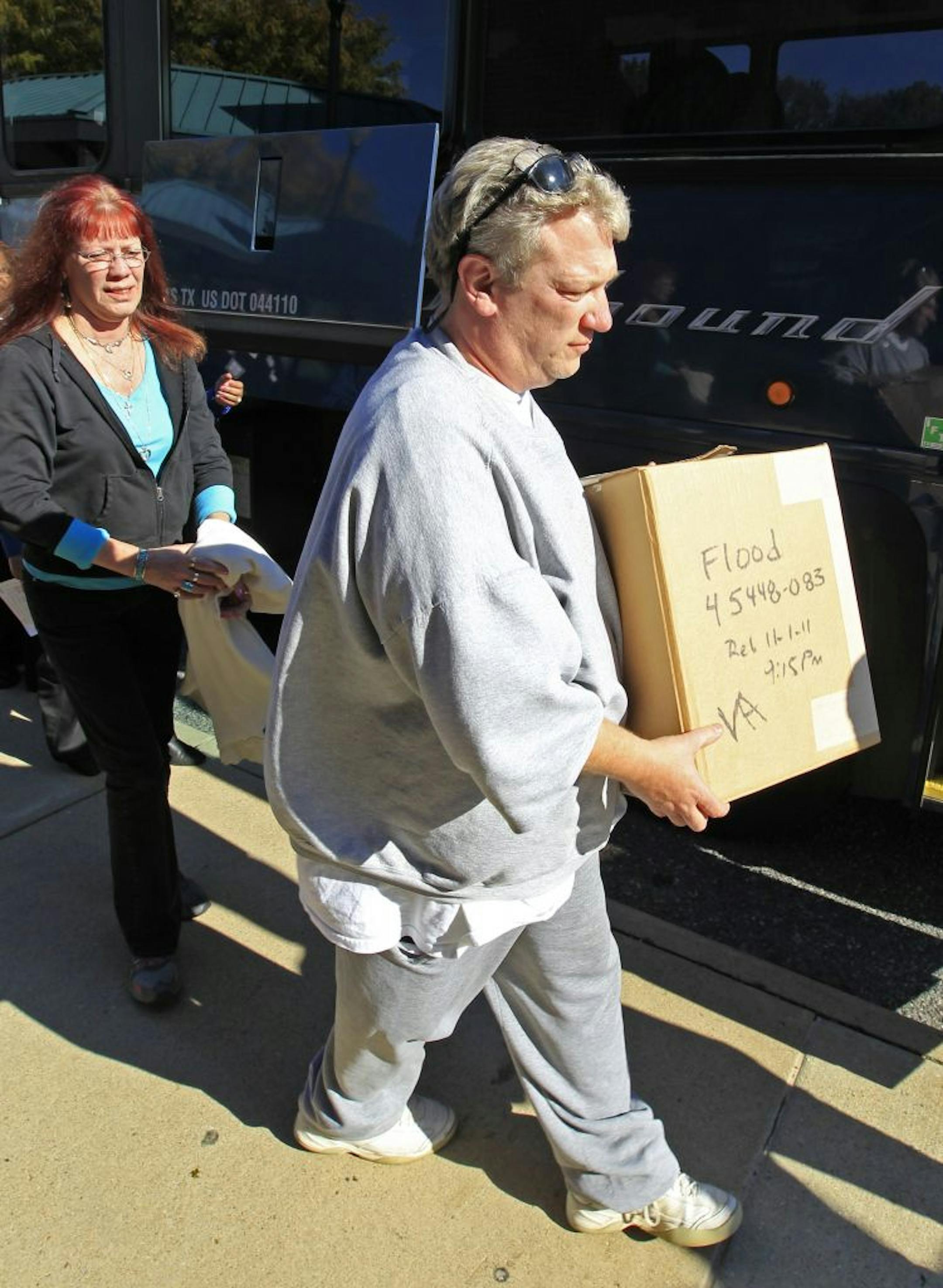 Darryl Flood, right, with sister Susan Cardwell, had spent 10 years in prison after he pleaded guilty to conspiracy to distribute crack cocaine. His early release might be the first of up to 12,000 inmates to fall under the new sentencing rules.