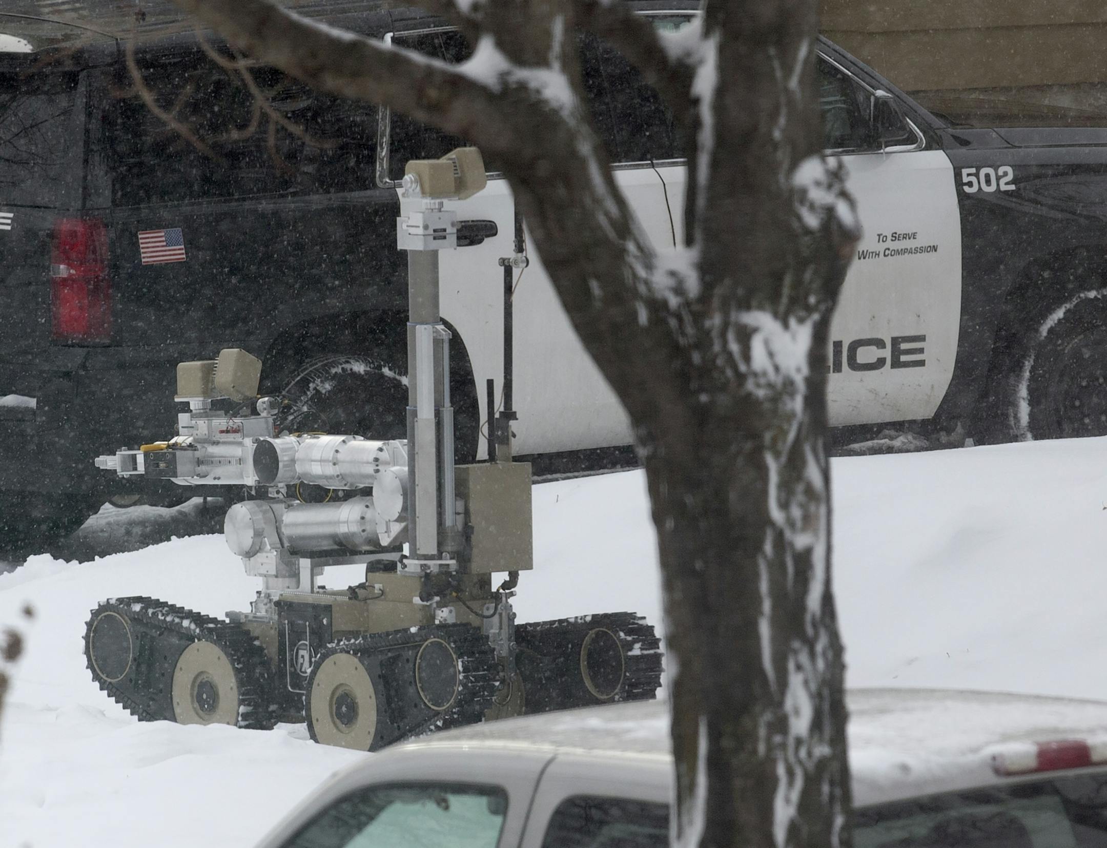 A robot is used as authorities responded to the scene of a shooting at the 2700 block of Oakland Avenue South in Minneapolis.