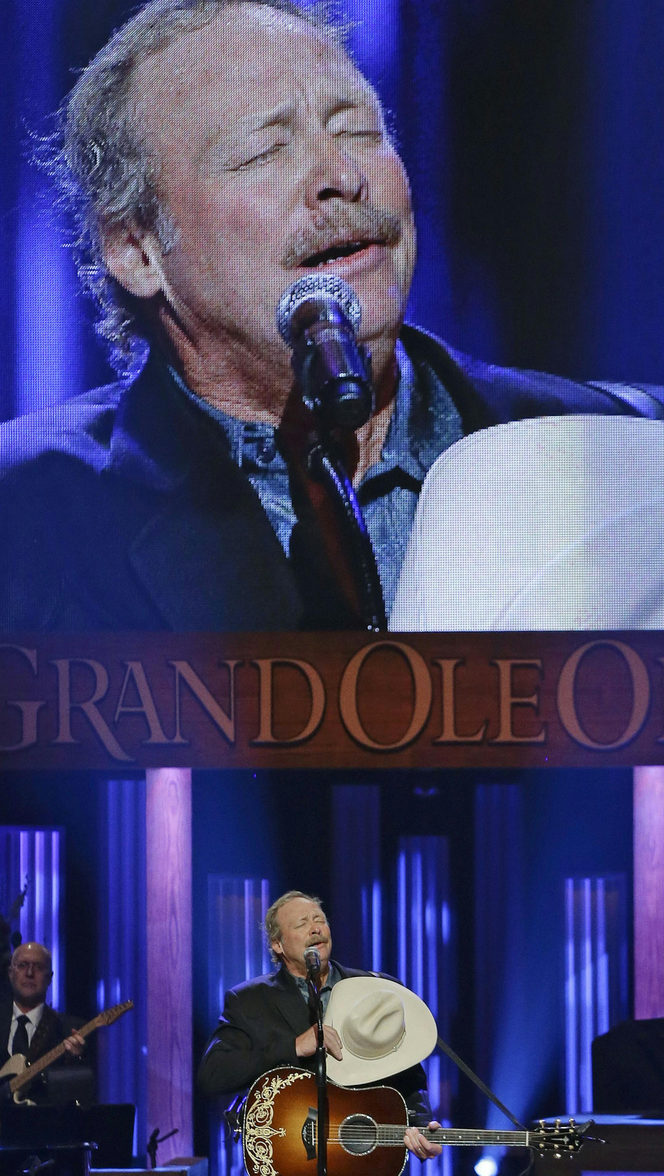Alan Jackson sings "He Stopped Loving Her Today" to close the funeral for country music star George Jones in the Grand Ole Opry House on Thursday, May 2, 2013, in Nashville, Tenn. Jones, one of country music's biggest stars who had No. 1 hits in four separate decades, died April 26. (AP Photo/Mark Humphrey, Pool)