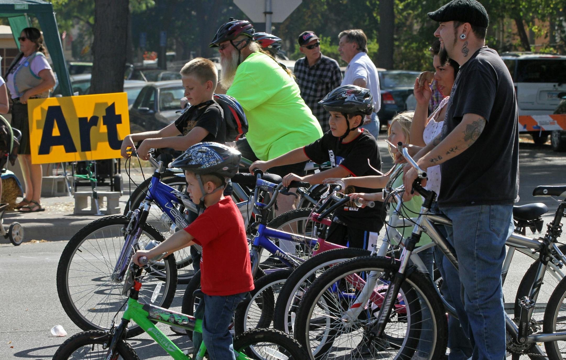 Bikers rode through a closed Lowery Ave North in Minneapolis during the Lowry Open Streets Minneapolis 2012 Harvest Fest. The one day event was sponsored by the Minneapolis Bicycle Coalition and the Lowry Corridor Business Association and featured community arts activities, food, live music, a car show and bike activities spread over 24 blocks on Lowry Ave on 9/29/12.