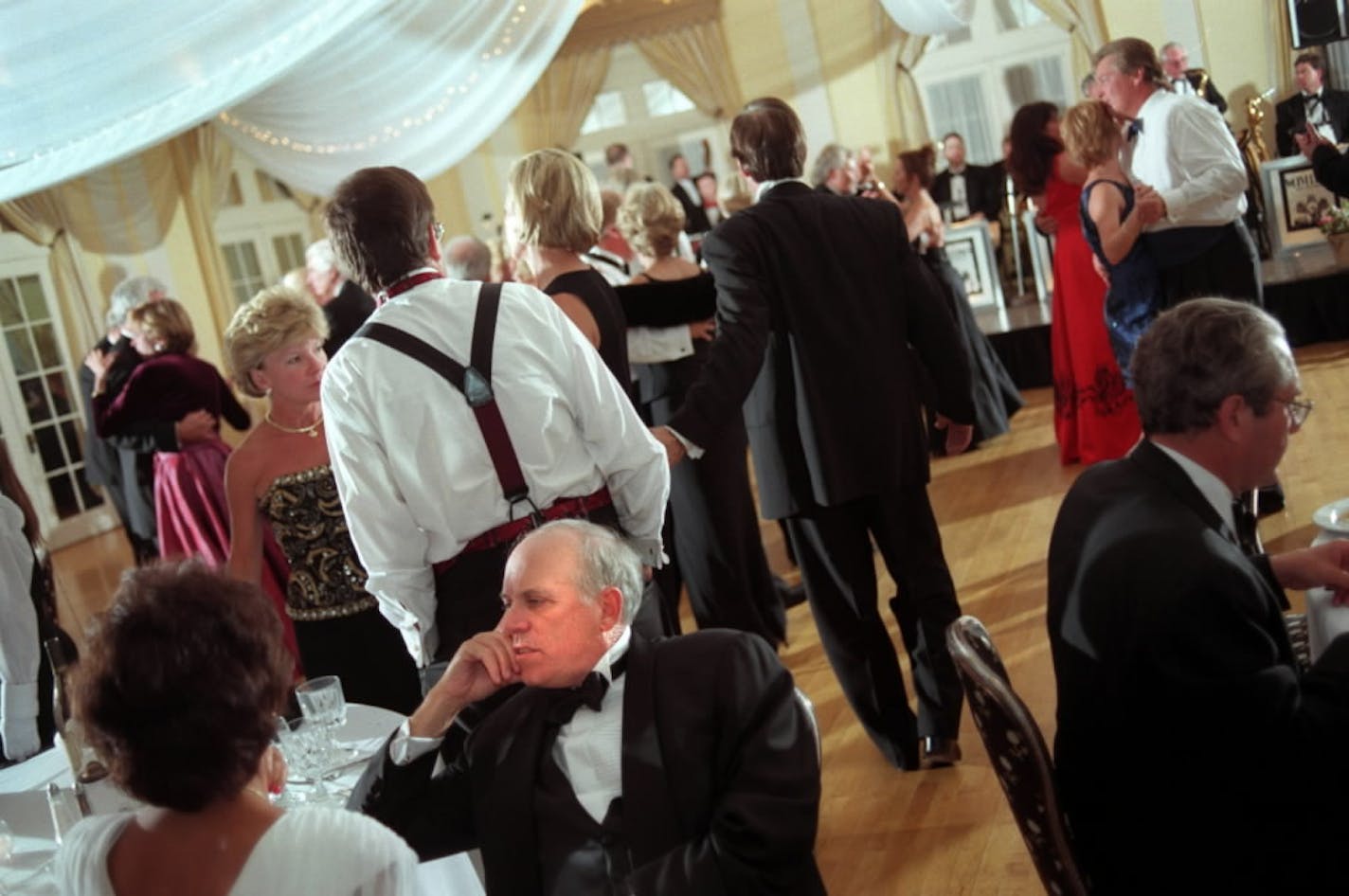 Attendees socialize at a reception at the Lafayette Club on the shores of Lake Minnetonka. Star 'Tribune file photo