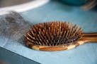 Annrene Rowe's hairbrush at her home in Anna Maria, Fla., on Sept. 18, 2020. Rowe was hospitalized for 12 days with coronavirus symptoms earlier this 