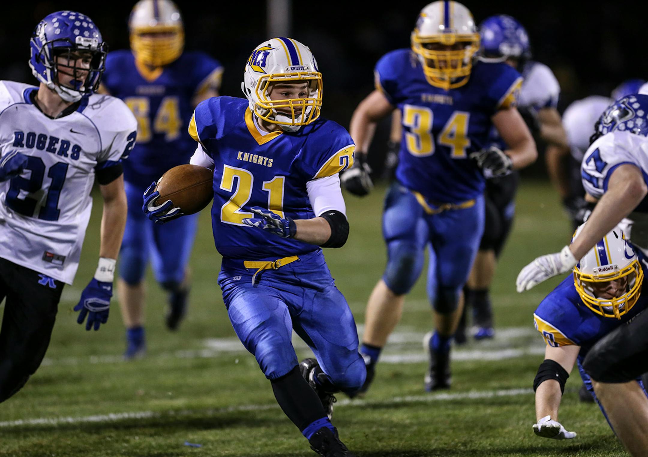 St. Michael-Albertville's Tyler Hayes ran a 32 yard kick off return during the second half of a prep football game between Rogers and St. Michael-Albertville on October 15.