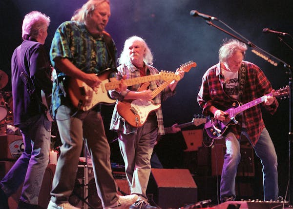 concert review of Crosby Stills Nash &amp; Young — Left to right---Graham Nash, Stephen Stills, David Crosby, and Neil Young performed Carry On and 