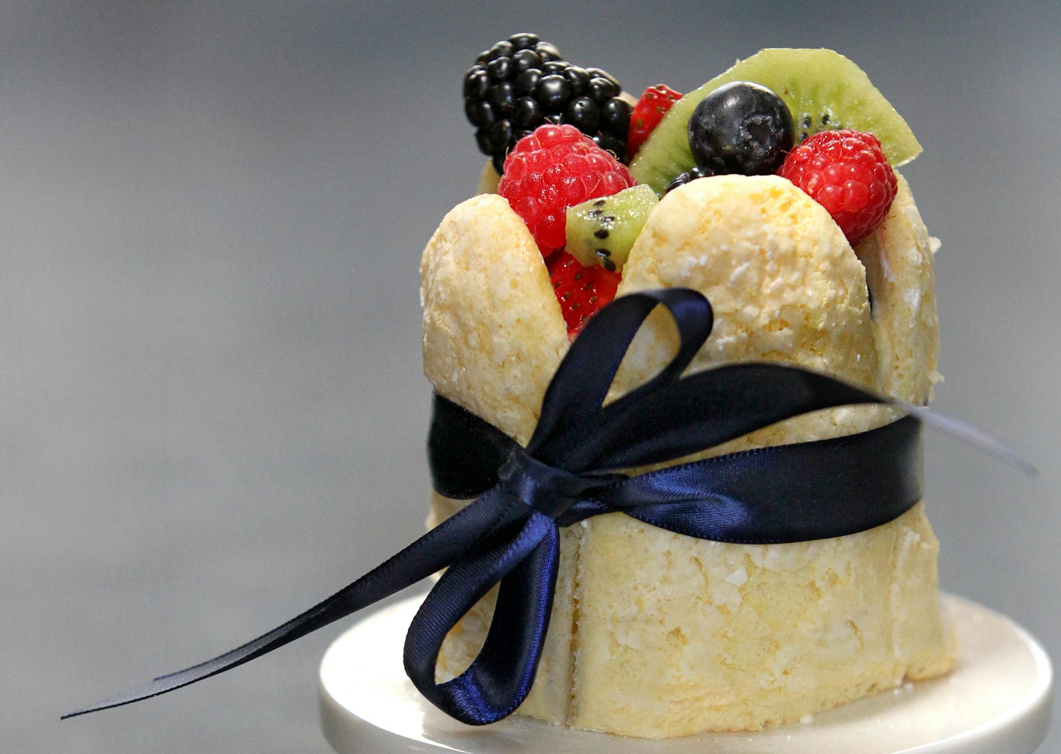 Charlottes: Ladyfingers filled with lemon mousse and curd and topped with fruit make for an elegant spring dessert.
