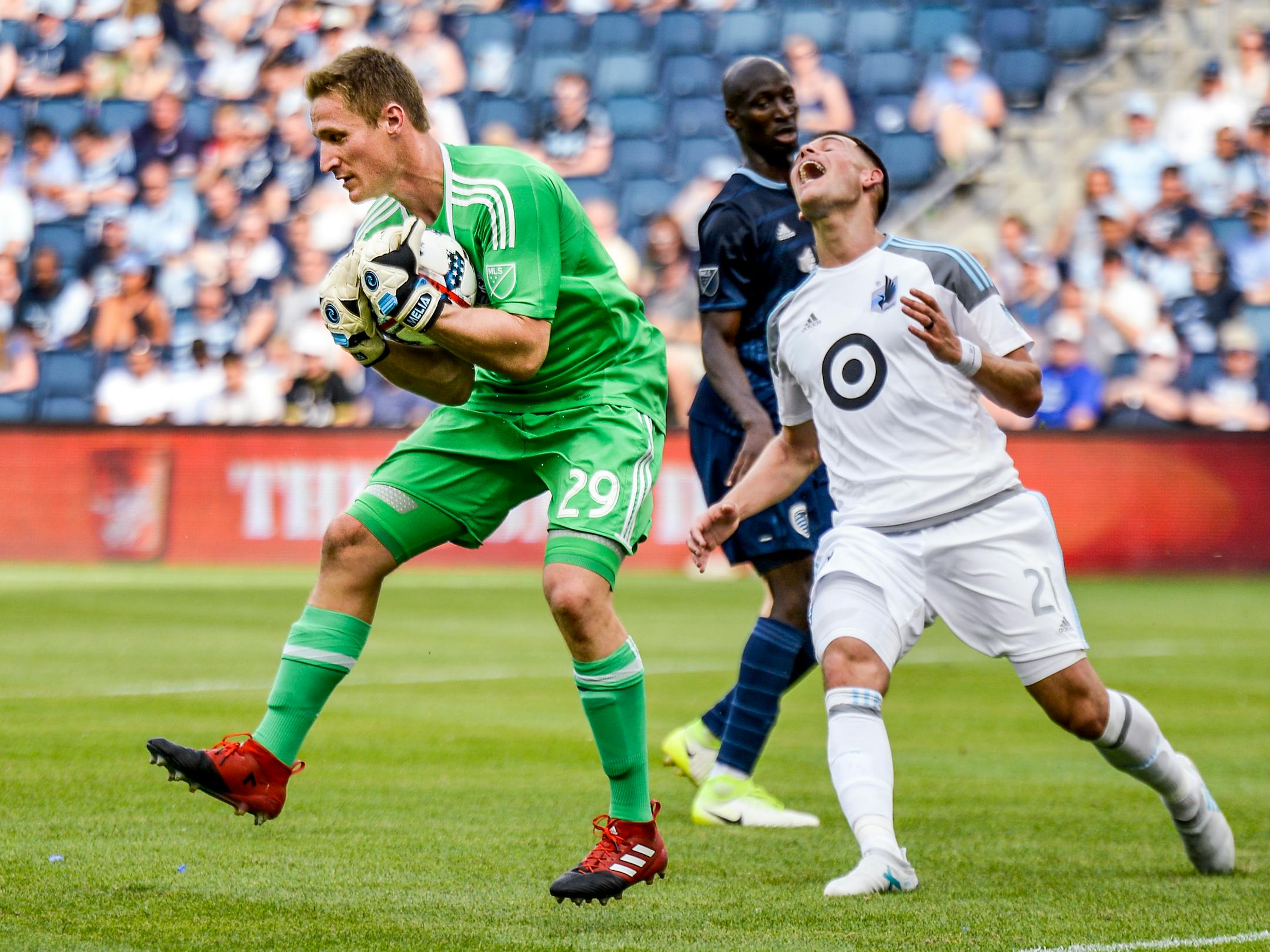 Sporting Kansas City goalkeeper Tim Melia (29) caught a scoring attempt from the Minnesota United on Saturday during the second half of the MLS soccer match at Children�s Mercy Park in Kansas City, Kan. Sporting Kansas City won 3-0. ORG XMIT: B7310202769Z.1