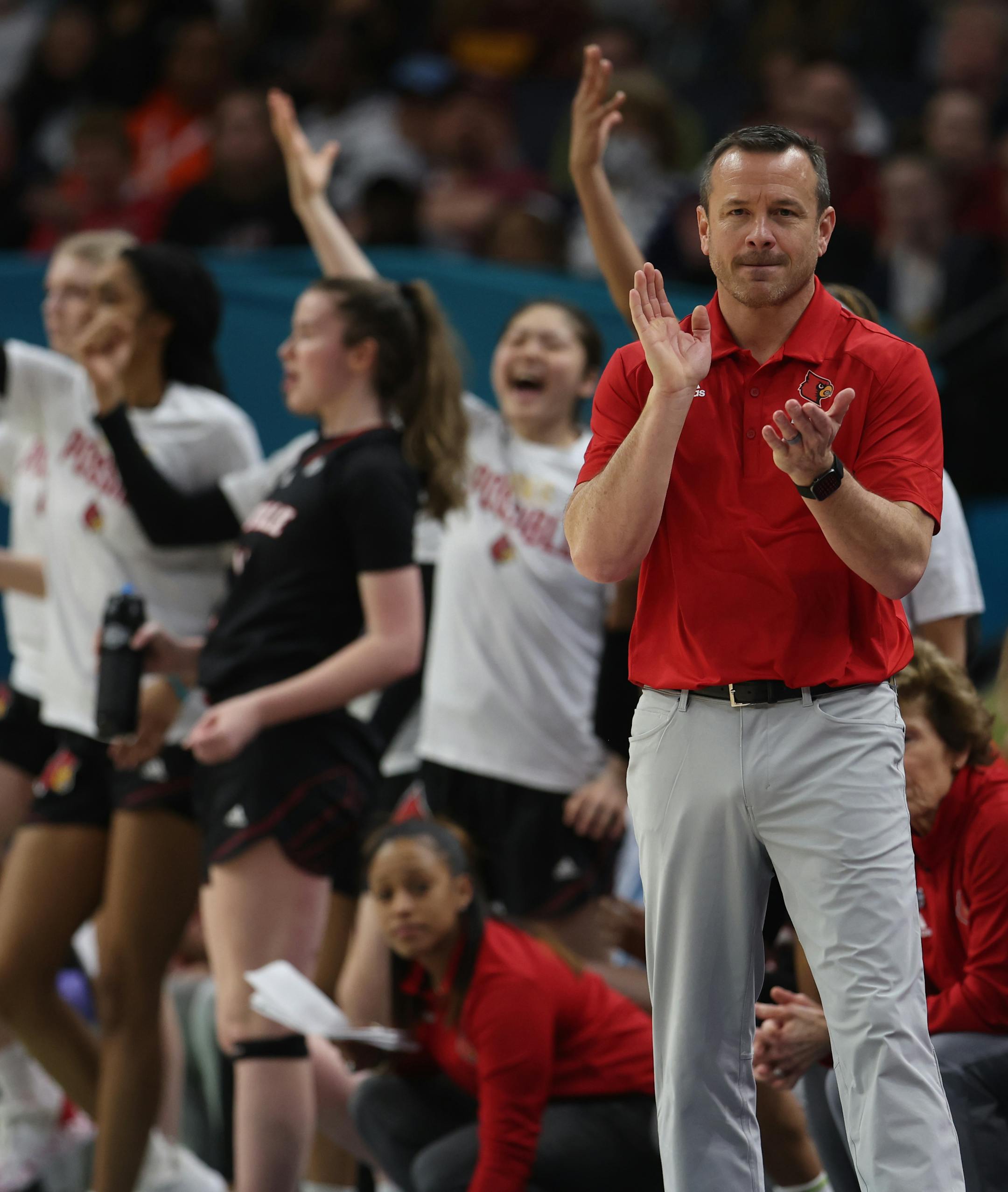 Louisville head coach Jeff Walz reacts during the game.