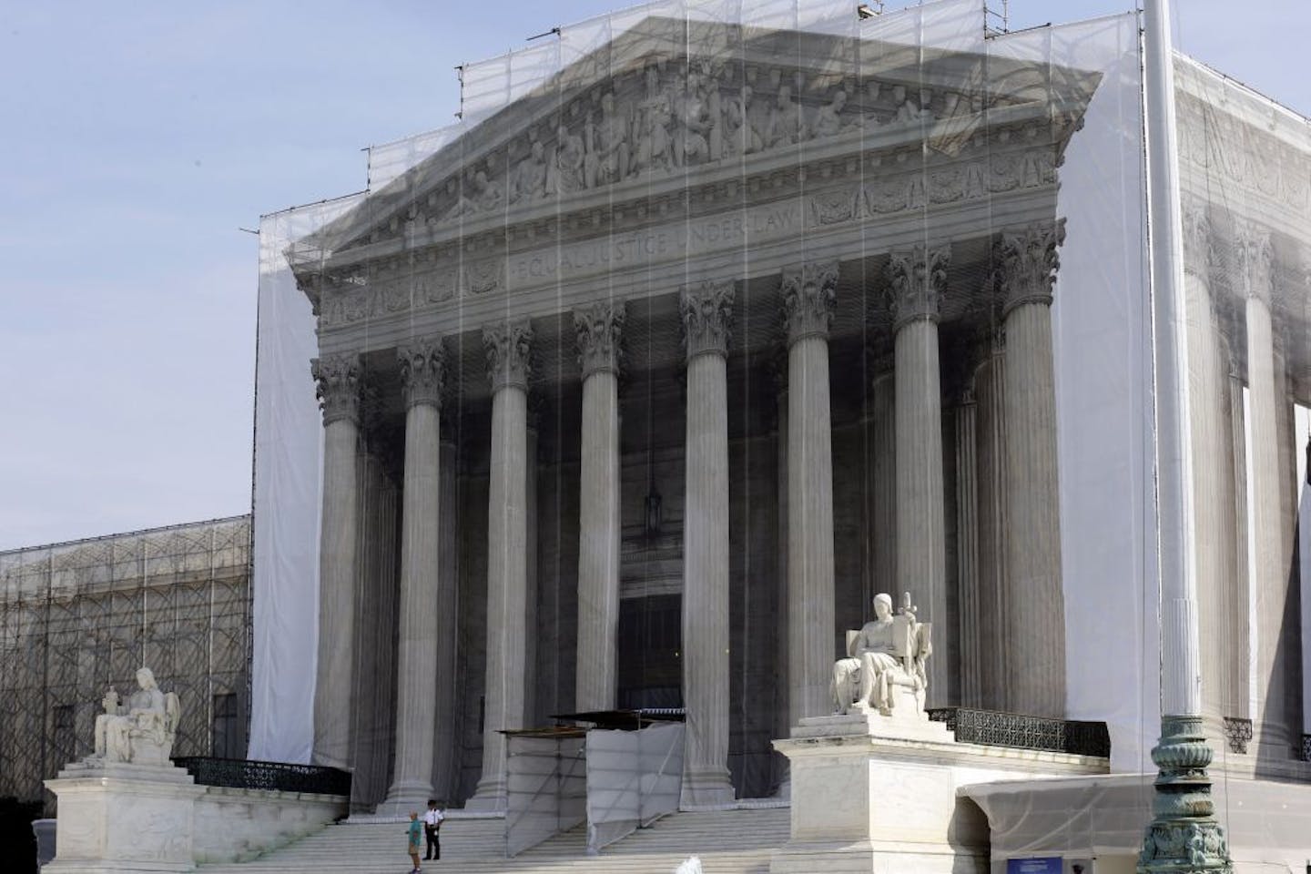 ADVANCE FOR SUNDAY, SEPT. 30 AND THEREAFTER - The Supreme Court building in Washington, Thursday, Sept. 27, 2012, under a protective scrim, as work continues on the facade. The Supreme Court is embarking on a new term beginning Monday that could be as consequential as the last one with the prospect for major rulings about affirmative action, gay marriage and voting rights.