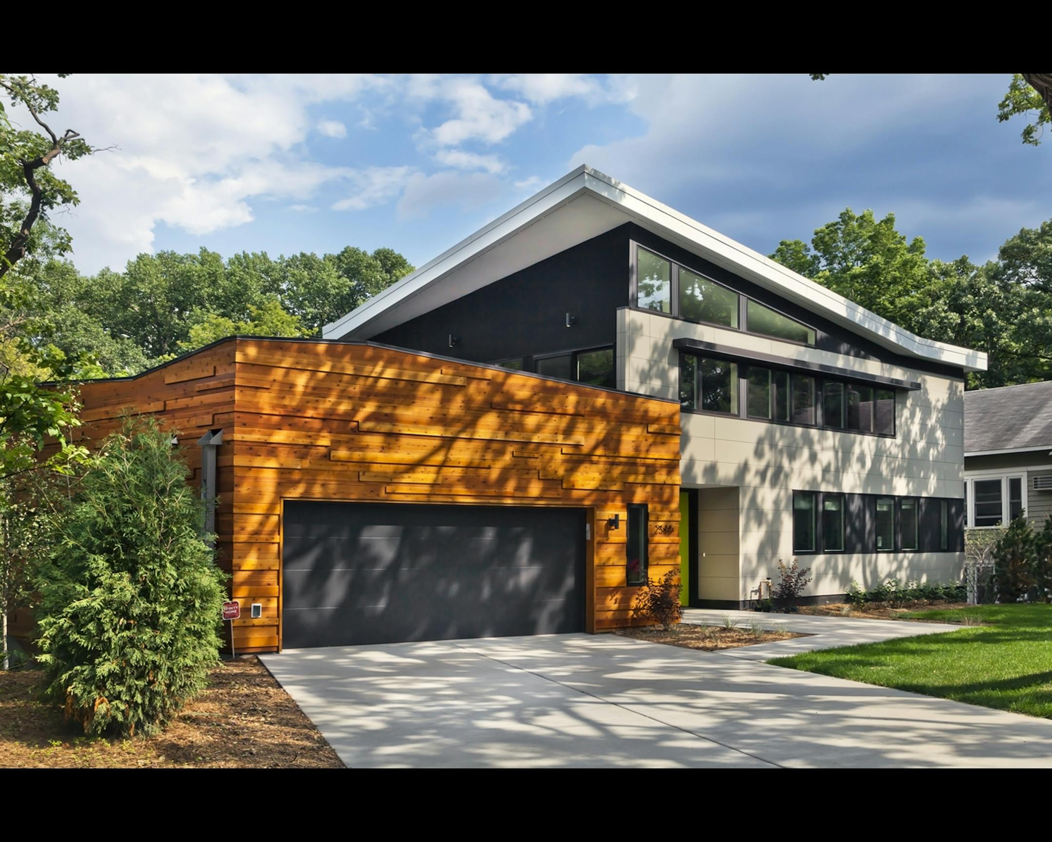 Home of the Month: RoehrSchmitt Architecture translated the best features of a family's downtown loft into a new modern home . Credit Gilbertson Photography