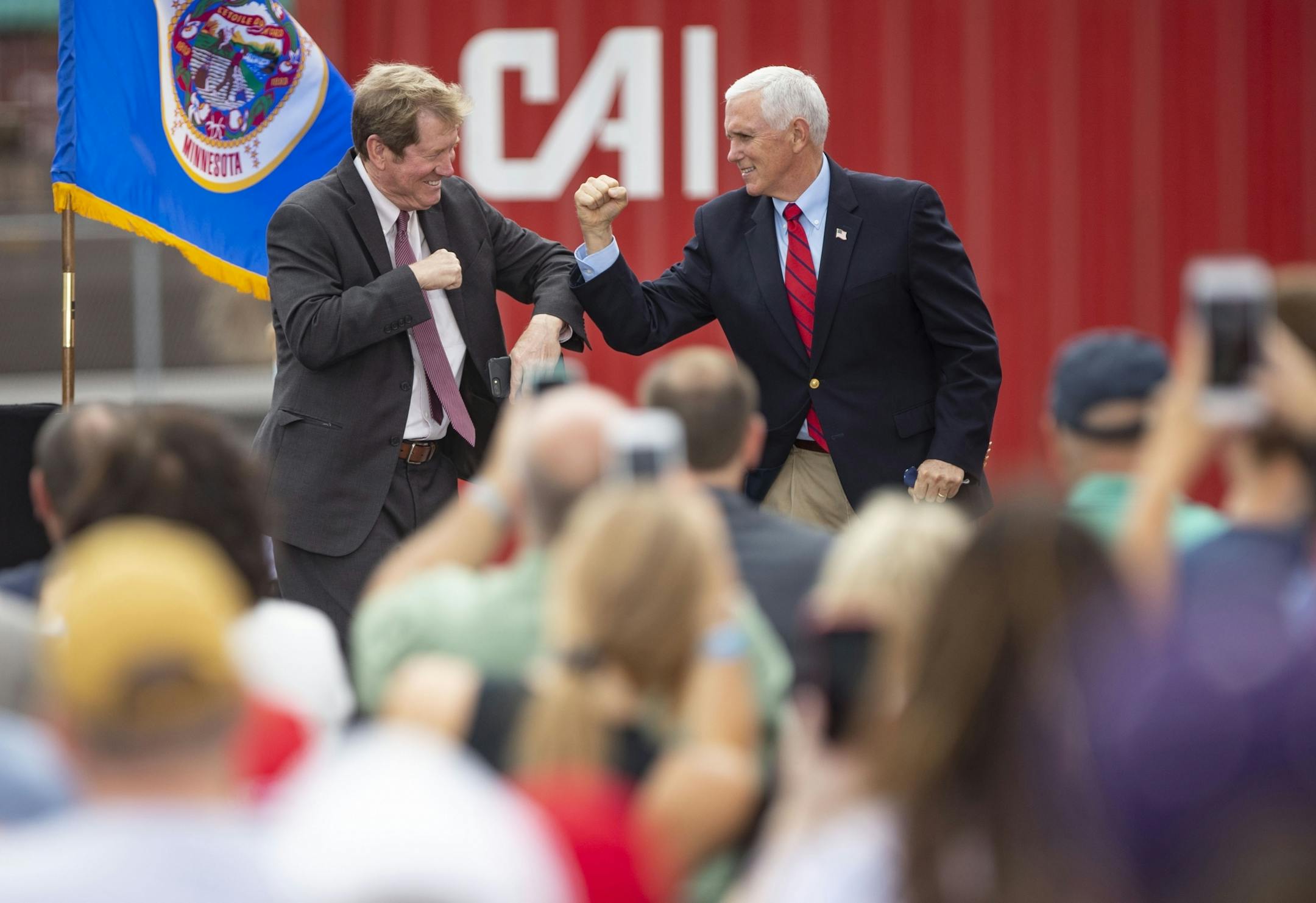 Former U.S. Representative Jason Lewis greeted Vice President Mike Pence after introducing him at the campaign event on Friday in Duluth. Lewis is currently running for a Senate seat to represent Minnesota.