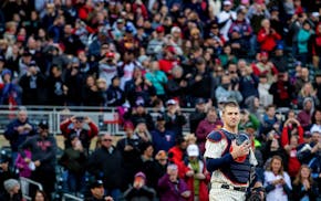 Joe Mauer's catching appearance a reminder of what was lost