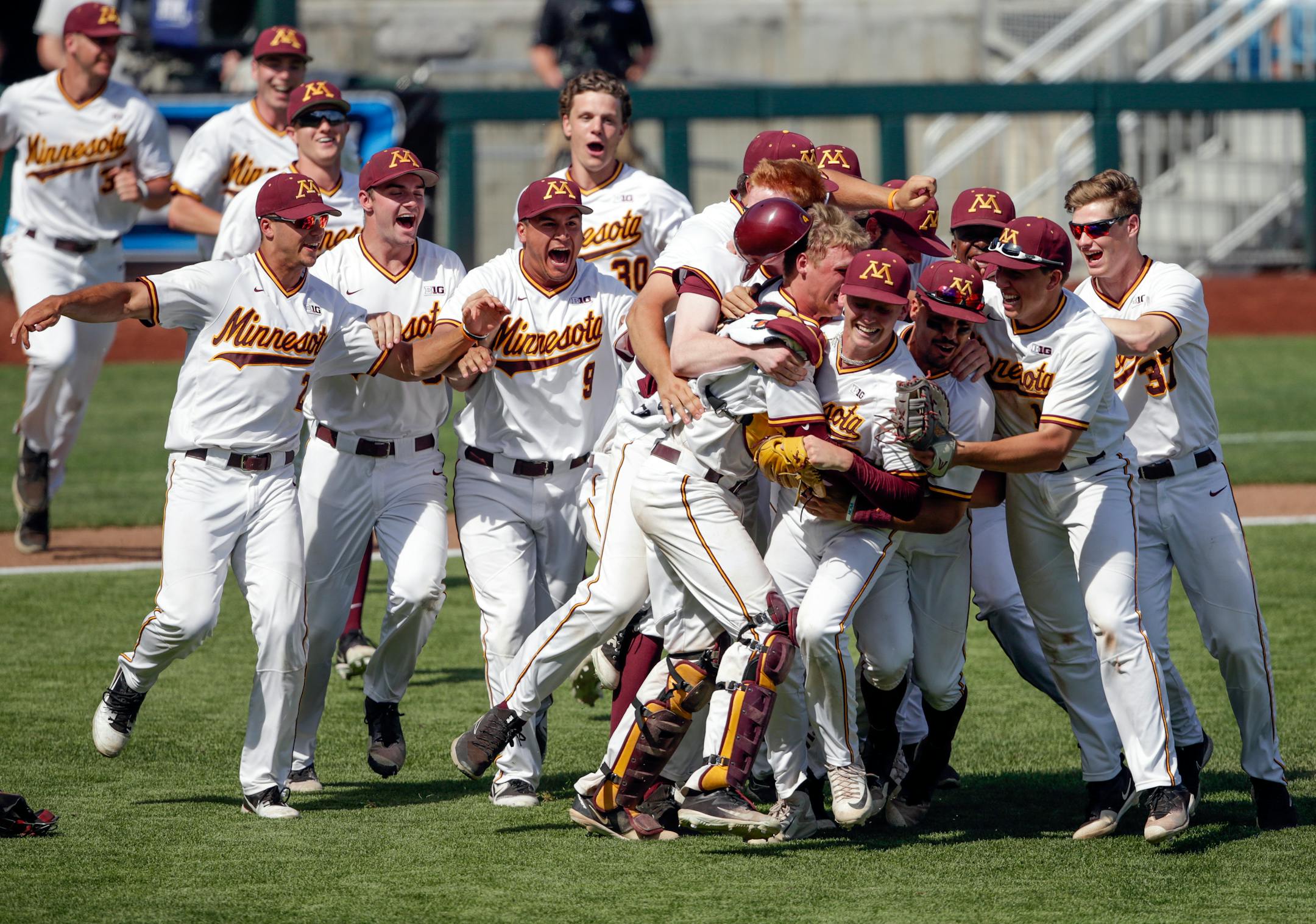 The Gophers celebrated following their 6-4 victory over Purdue for the Big Ten baseball tournament championship in Omaha, Neb., on Sunday.