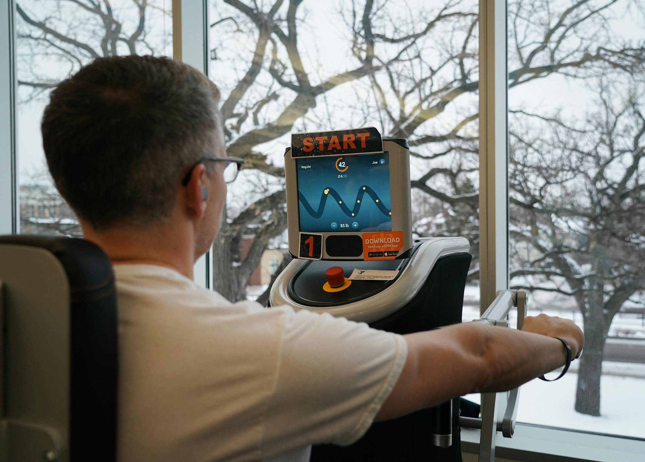 Joe Mueller of St. Paul uses the eGym machines as part of his fitness routine. ] Shari L. Gross &#x2022; shari.gross@startribune.com A new Apple Watch program is debuting through the YMCA of the Greater Twin Cities which will allow members to real-time track and engage with their Y through their Apple Watch. Members can check-in, find classes, track exercise, participate in challenges and connect to cardio fitness equipment via their ap. The St. Paul Midway YMCA will be one of the first Apple Wa