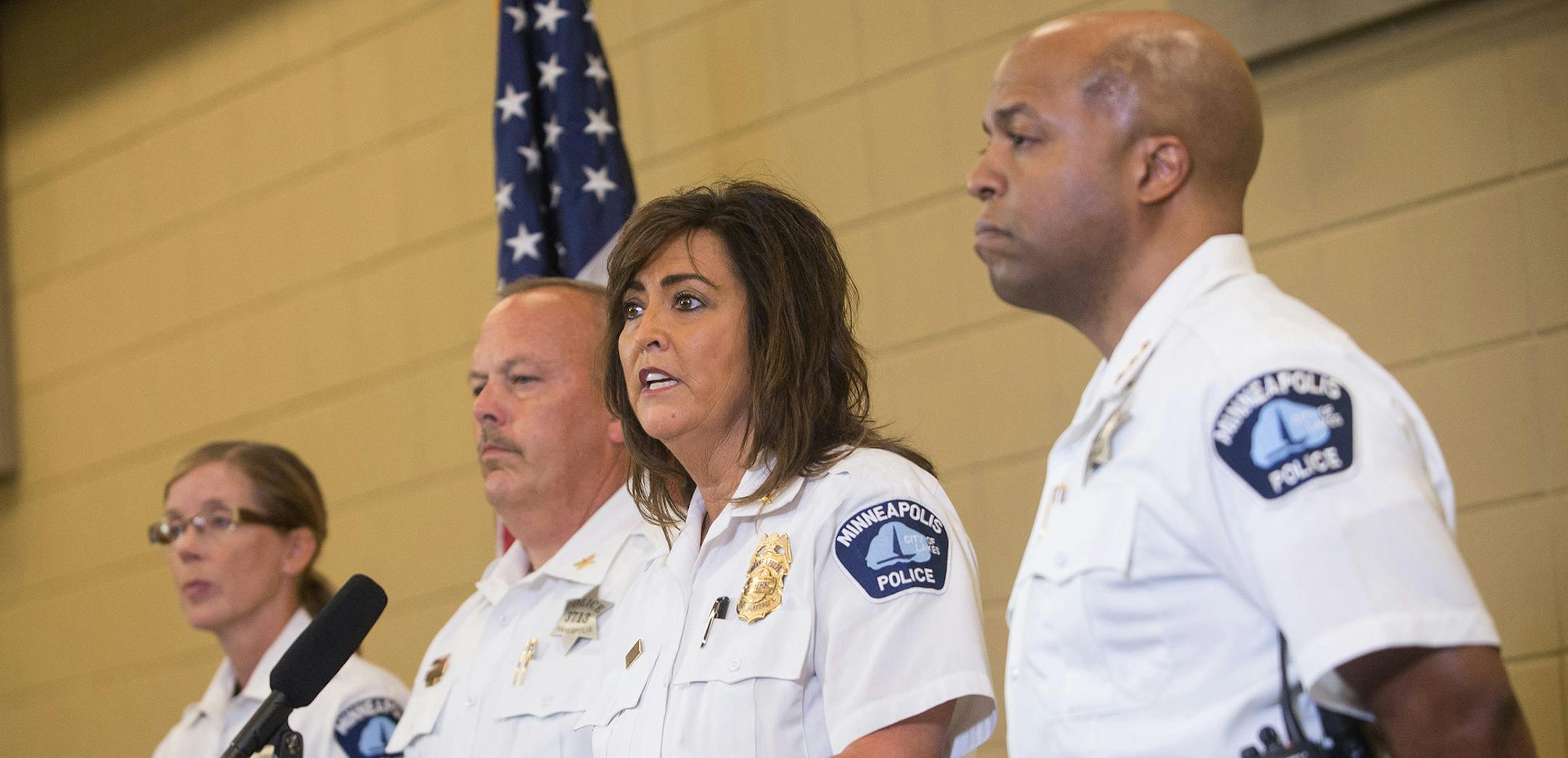 Minneapolis Police Chief Janee Harteau speaks to the media on Thursday, July 20, 2017, at the Emergency Operations Training Facility in Minneapolis. She is joined by, from left, inspector Kathy Waite, inspector Mike Kjos, and assistant Chief Medaria Arradondo. (Aaron Lavinsky/Minneapolis Star Tribune/TNS) ORG XMIT: 1206846 ORG XMIT: MIN1707202040404146