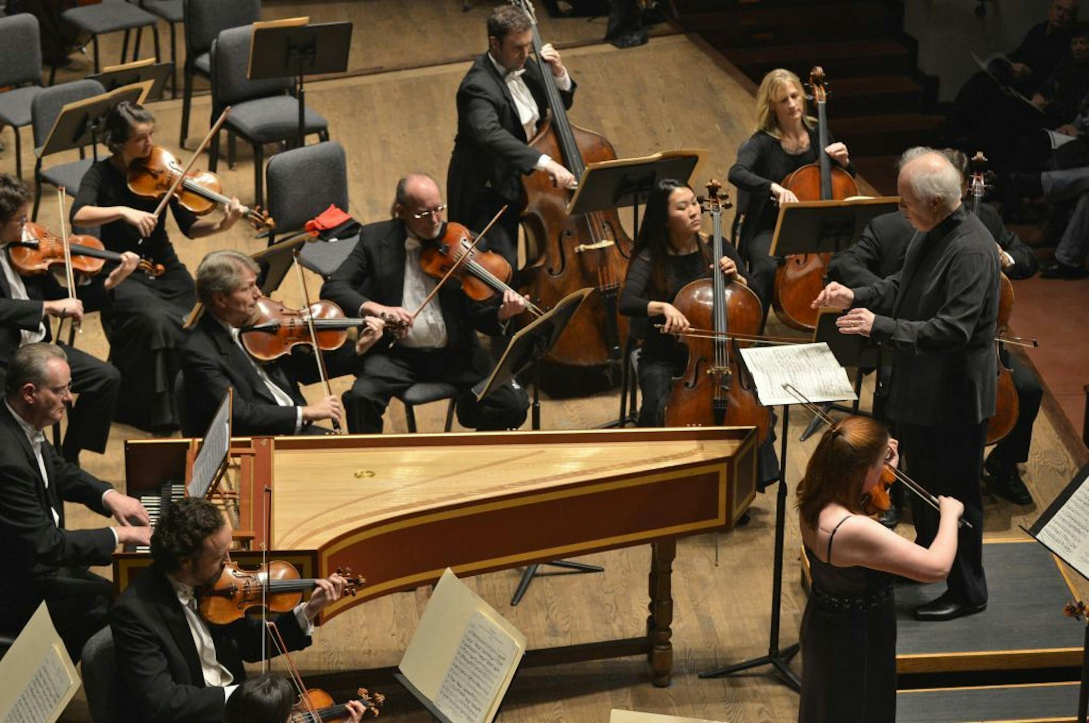Guest conductor Edo de Waart joined the locked out Musicians of the Minnesota Orchestra Saturday night at Ted Mann Concert Hall. The performance began with Bach's Double Violin Concerto featuring Jorja Fleezanis and Erin Keefe (bottom right).