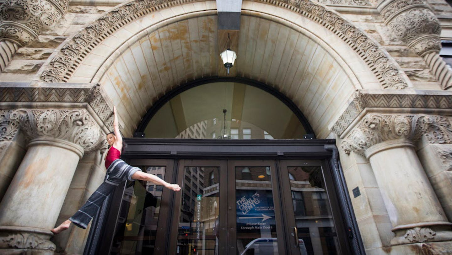 Sally Rousse, shown near the entrance of the Cowles Center, has created a new show celebrating the building. BACKGROUND INFORMATION: Sally Rousse poses for photos in different spots around The Cowles Center for Dance & the Performing Arts in Minneapolis on Wednesday, May 9, 2018. Rousse, the artist in residence at The Cowles Center, will present a new work inspired entirely by 528 Hennepin Avenue called "ICON SAM: Temple Dances" a promenade performance experience that will take place throughout