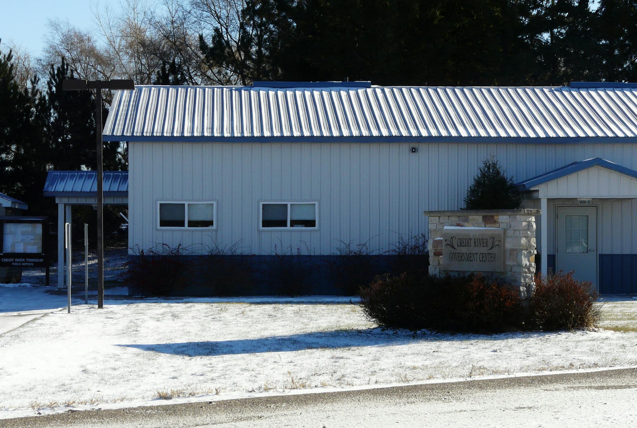 Photo by David Peterson Credit River's town hall, site of public struggles over the issue, is just a second or two away from the unhappy neighbors.