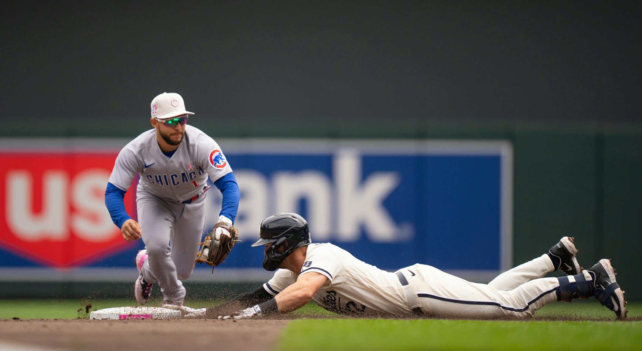 Minnesota Twins third baseman Kyle Farmer was well ahead of Chicago Cubs second baseman Nick Madrigal's tag after his third inning double.