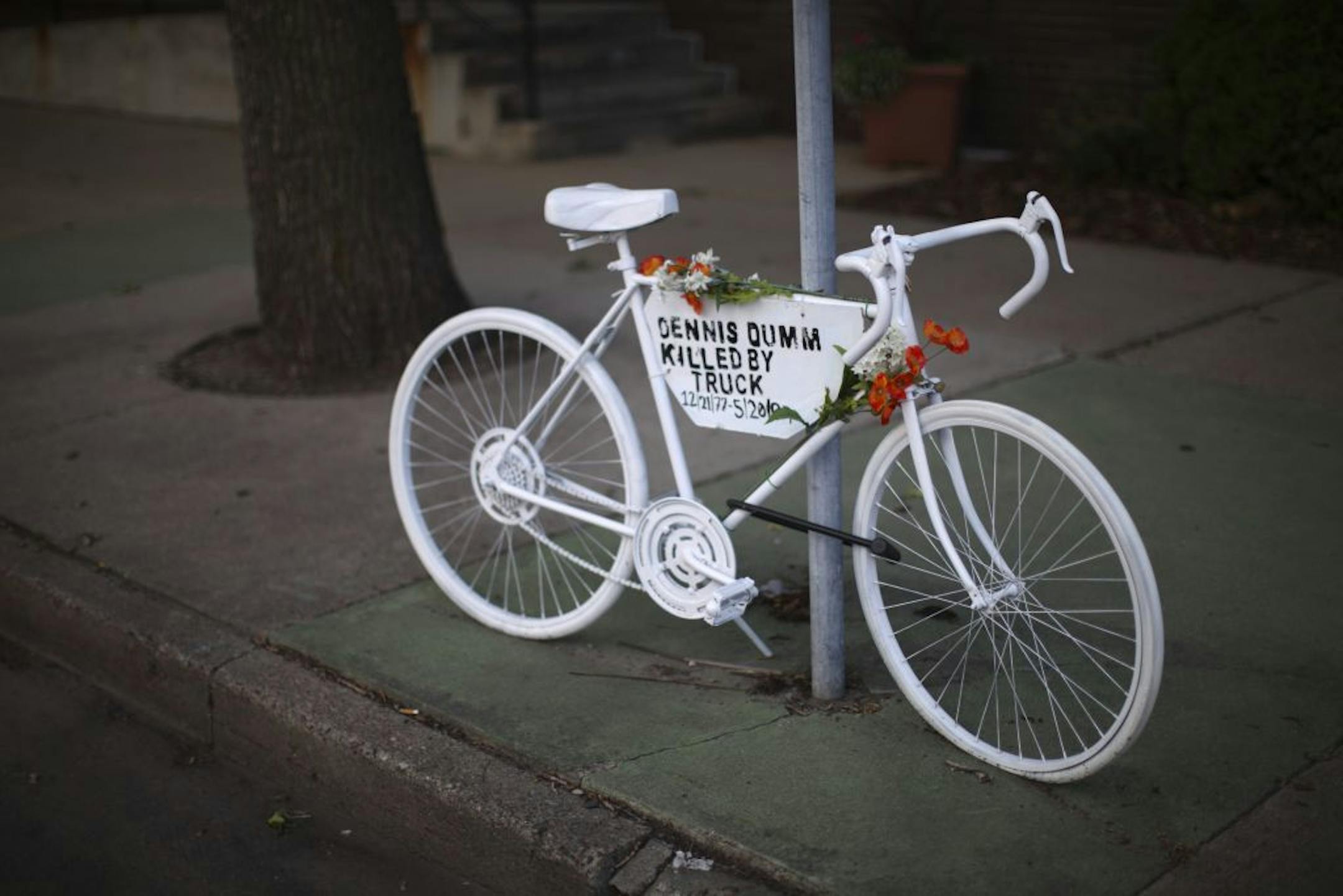 The ghost bike memorial for Dennis Dumm on Park Ave. S. at 14th St. late Wednesday afternoon.
