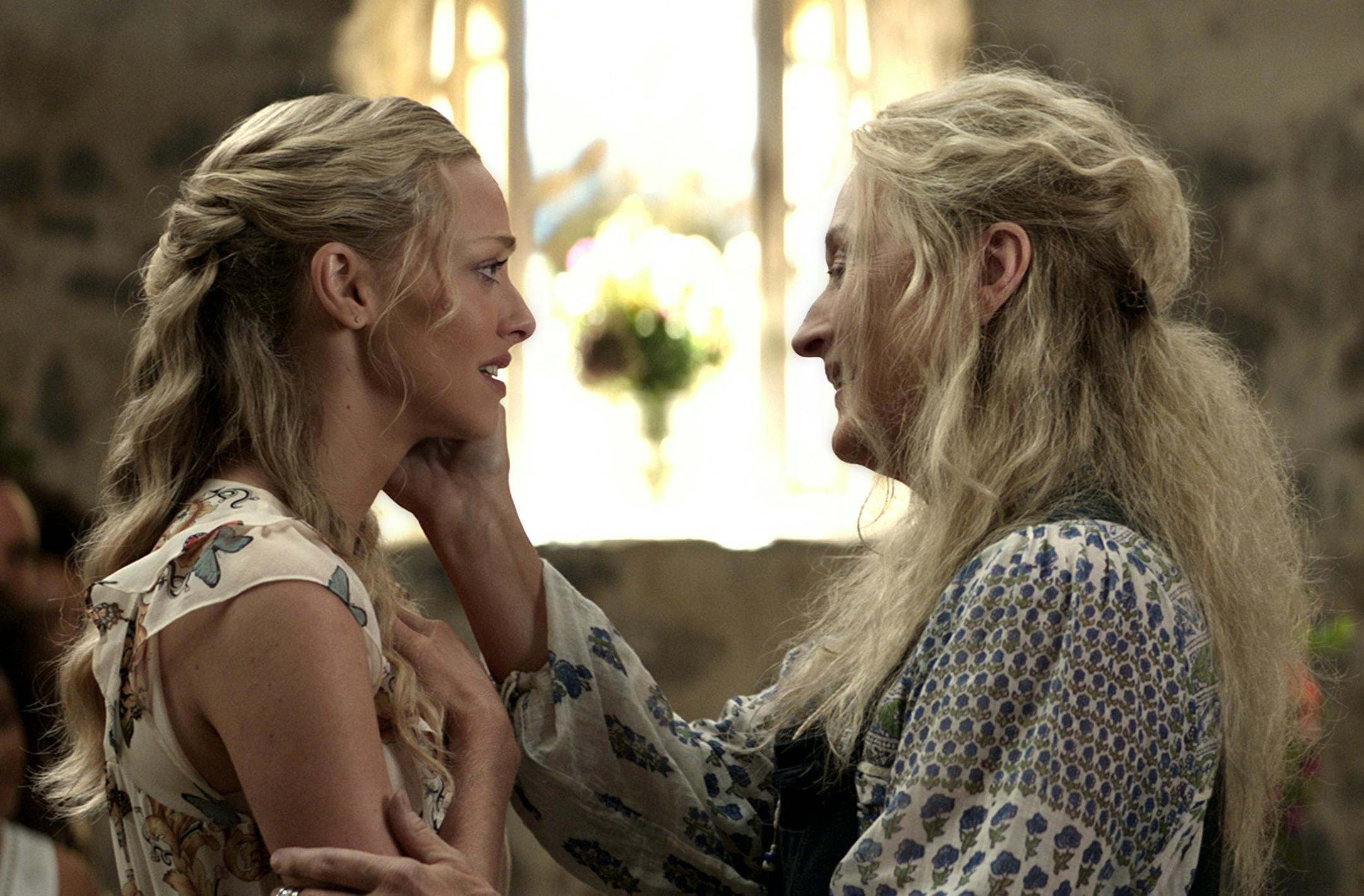 (L to R) Sophie (AMANDA SEYFRIED) and Donna (MERYL STREEP) in "Mamma Mia! Here We Go Again." Ten years after "Mamma Mia! The Movie," you are invited to return to the magical Greek island of Kalokairi in an all-new original musical based on the songs of ABBA.