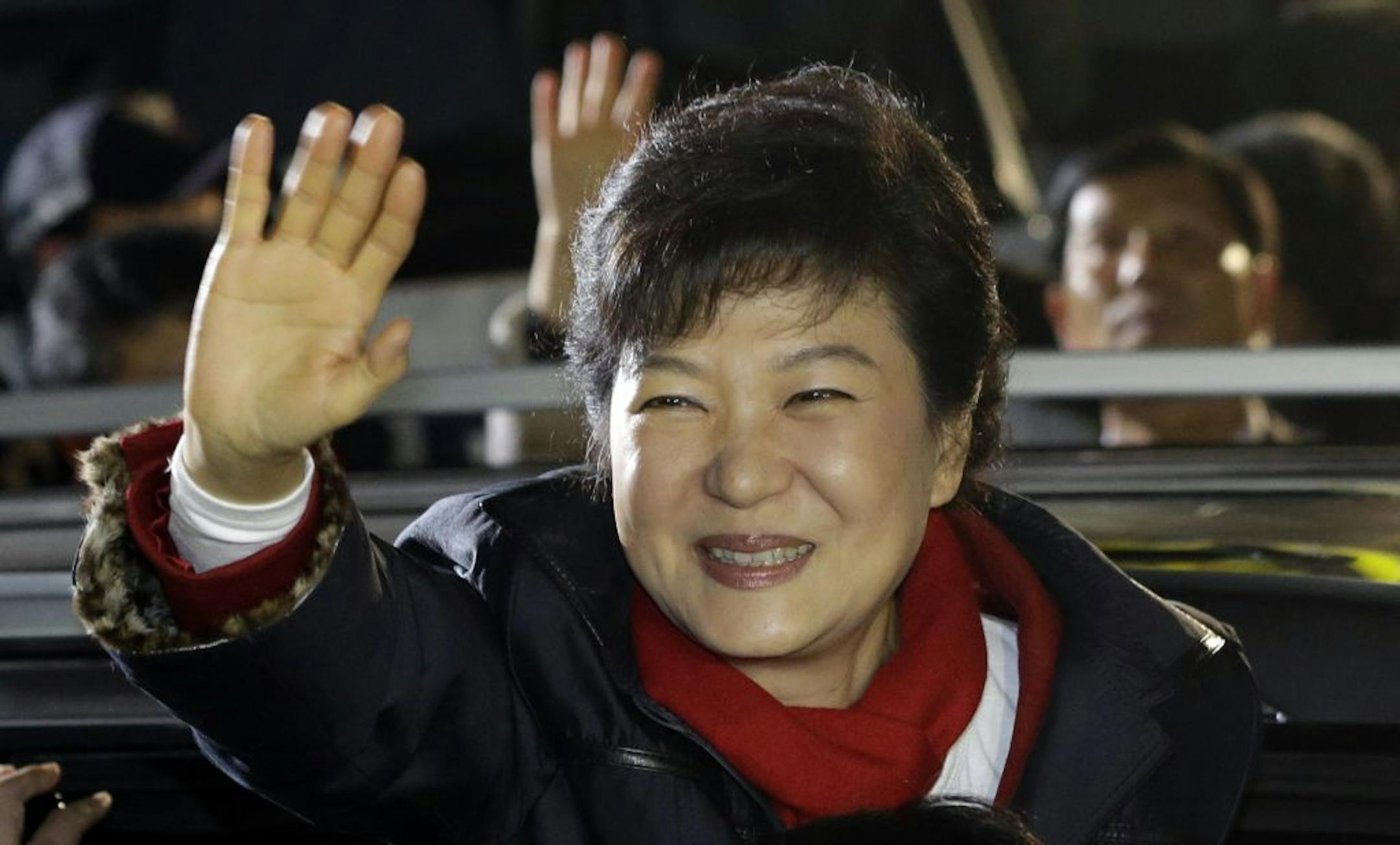 South Korea's presidential candidate Park Geun-hye of ruling Saenuri Party waves to her supporters near the party's head office in Seoul, South Korea, Wednesday, Dec. 19, 2012. South Korea�s presidential Blue House on Wednesday congratulated conservative Park Geun-hye (Bahk guhn-hae) for becoming president, although votes were still being counted in a close race. Park Geun-hye will return to her childhood home, from where her dictator father President Park Chung-hee ruled South Korea for 18-year