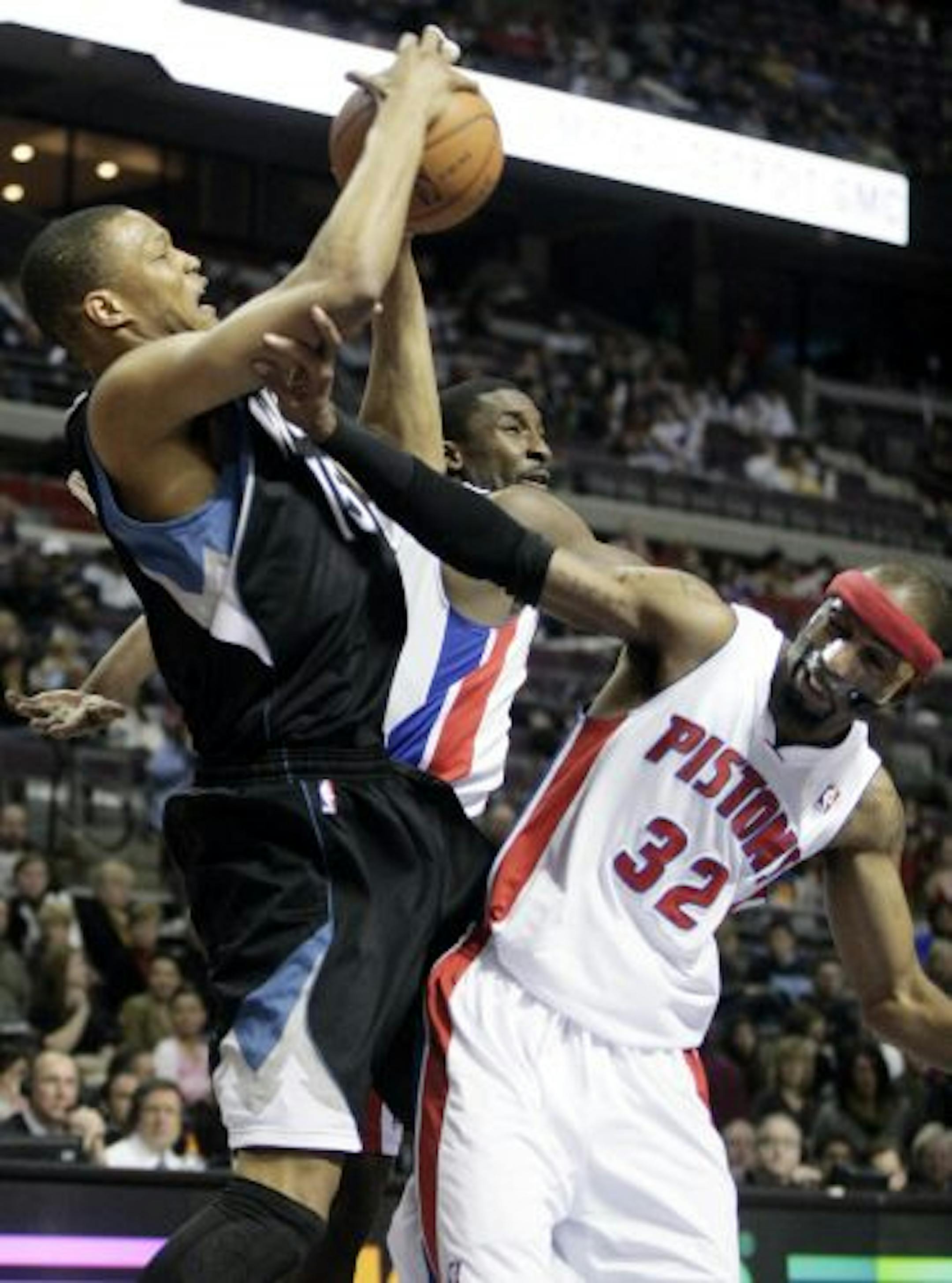 The Wolves' Anthony Randolph snagged one of his 10 rebounds despite a shove from Richard Hamilton. Randolph added 19 points.