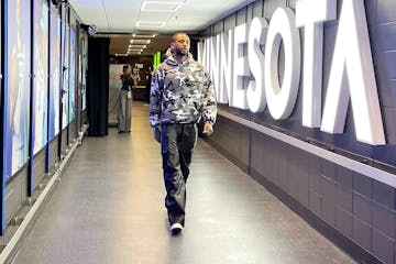 Timberwolves guard Nickeil Alexander-Walker walks into the locker room before Game 4 of the Western Conference finals against the Oklahoma City Thunde