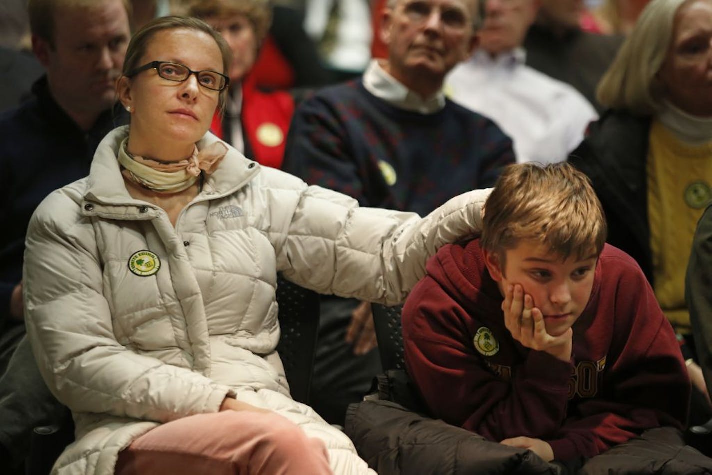 Jasmine Hoedeman and her son Lucas, 11, reacted with disappointment Thursday night to the Hopkins school board's vote against an Edina neighborhood's effort to leave the Hopkins district and join Edina's.