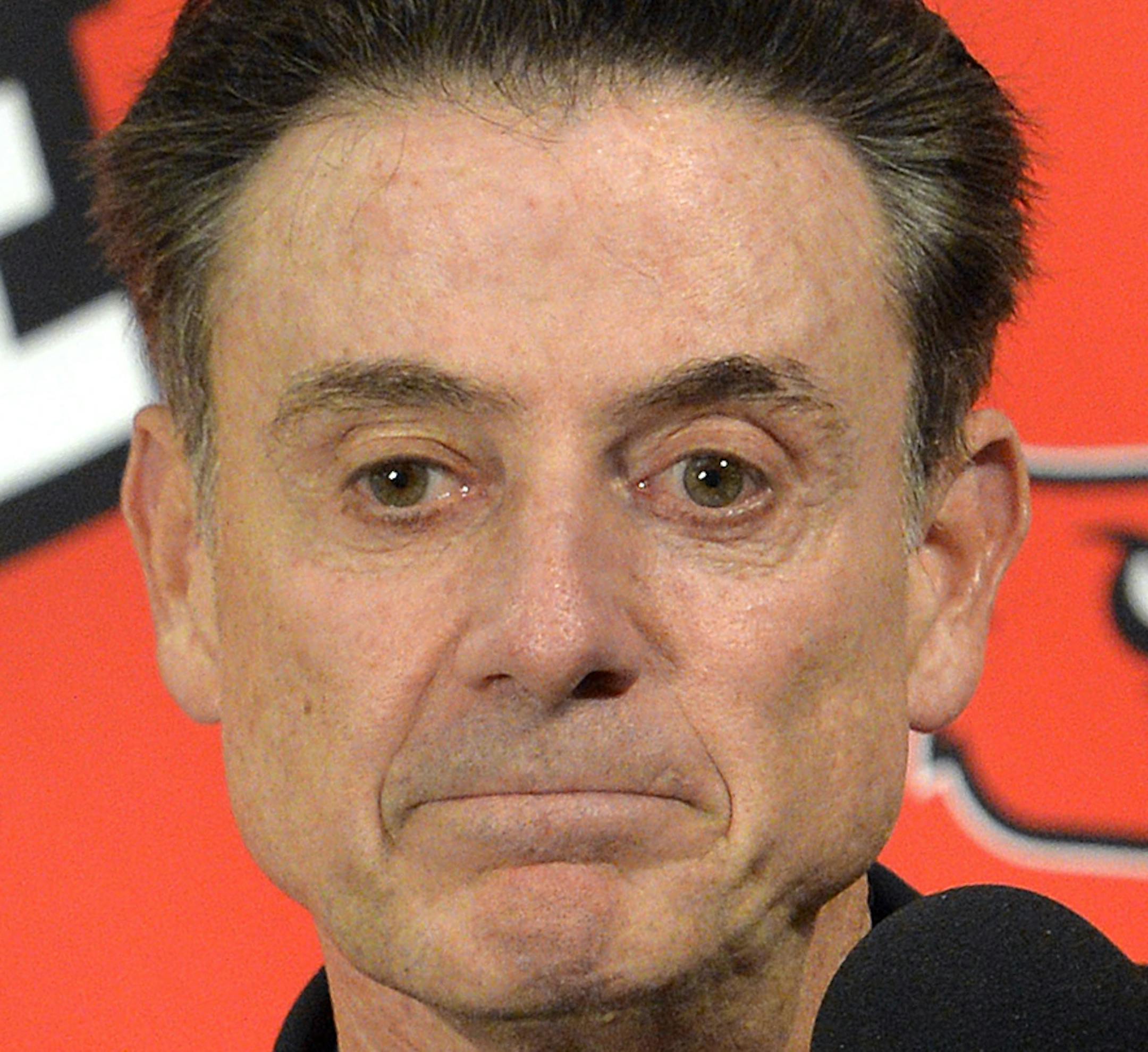 FILE - In this Oct. 3, 2015, file photo, Louisville head coach Rick Pitino responds to a question following an NCAA college basketball team's intrasquad scrimmage in Louisville, Ky. Escort Katina Powell says she has no proof that Louisville coach Rick Pitino knew that a former Cardinals staffer hired her and other dancers to strip and have sex with former recruits and players. But Powell said Tuesday, Oct. 20, 2015, on ABCís ìGood Morning Americaî that with ìa boatloadî