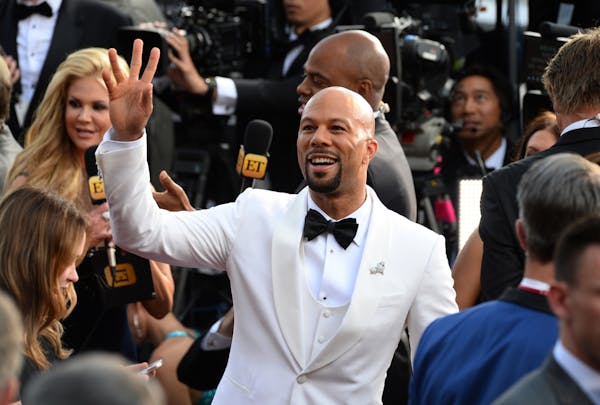 Common arrives at the Oscars on Sunday, Feb. 28, 2016, at the Dolby Theatre in Los Angeles.