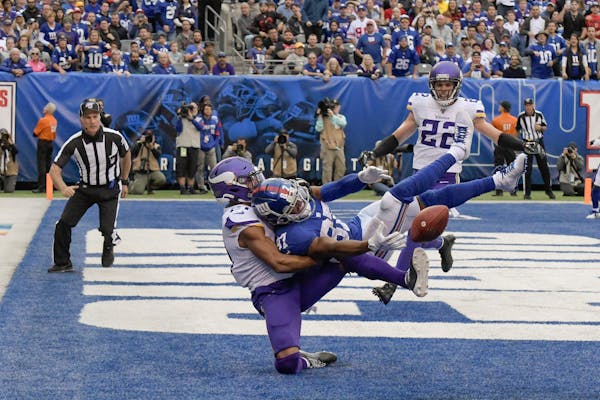 Vikings cornerback Mike Hughes (21) broke up a pass in the end zone intended for Giants wide receiver Sterling Shepard in the fourth quarter Sunday.