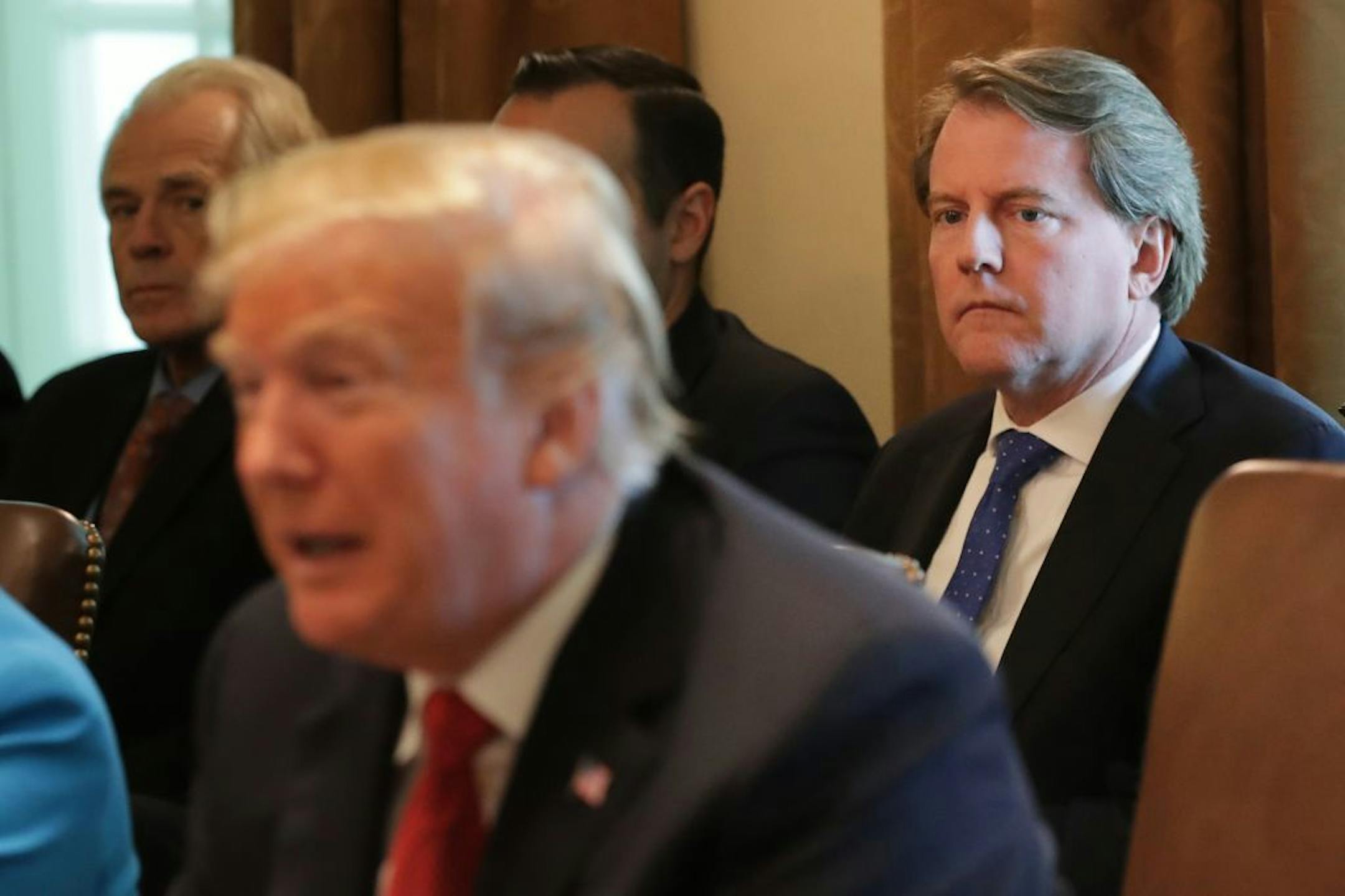 White House Counsel Don McGahn, right, attended a cabinet meeting with President Donald Trumpat the White House Oct. 17, 2018 in Washington. As Trump campaigned for president in 2016, a Jones Day partner, Donald McGahn, served as his outside lawyer, leading recount fights in critical states. McGahn later became Trump's White House counsel, before returning to Jones Day.