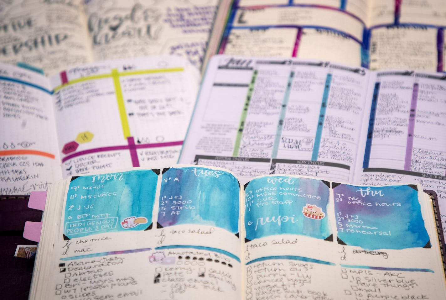 The bullet journals of Jessica Chung. Chung runs "Pretty Prints and Paper," a blog dedicated to all things bullet journal, and teaches journaling and calligraphy classes both online and in person. ] CARLOS GONZALEZ &#xef; cgonzalez@startribune.com &#xf1; October 9, 2018, Minneapolis, MN, Minneapolis calligrapher Jessica Chung will demonstrate the art of bullet journaling. She runs "Pretty Prints and Paper," a blog dedicated to all things bullet journal, and teaches journaling and calligraphy cla