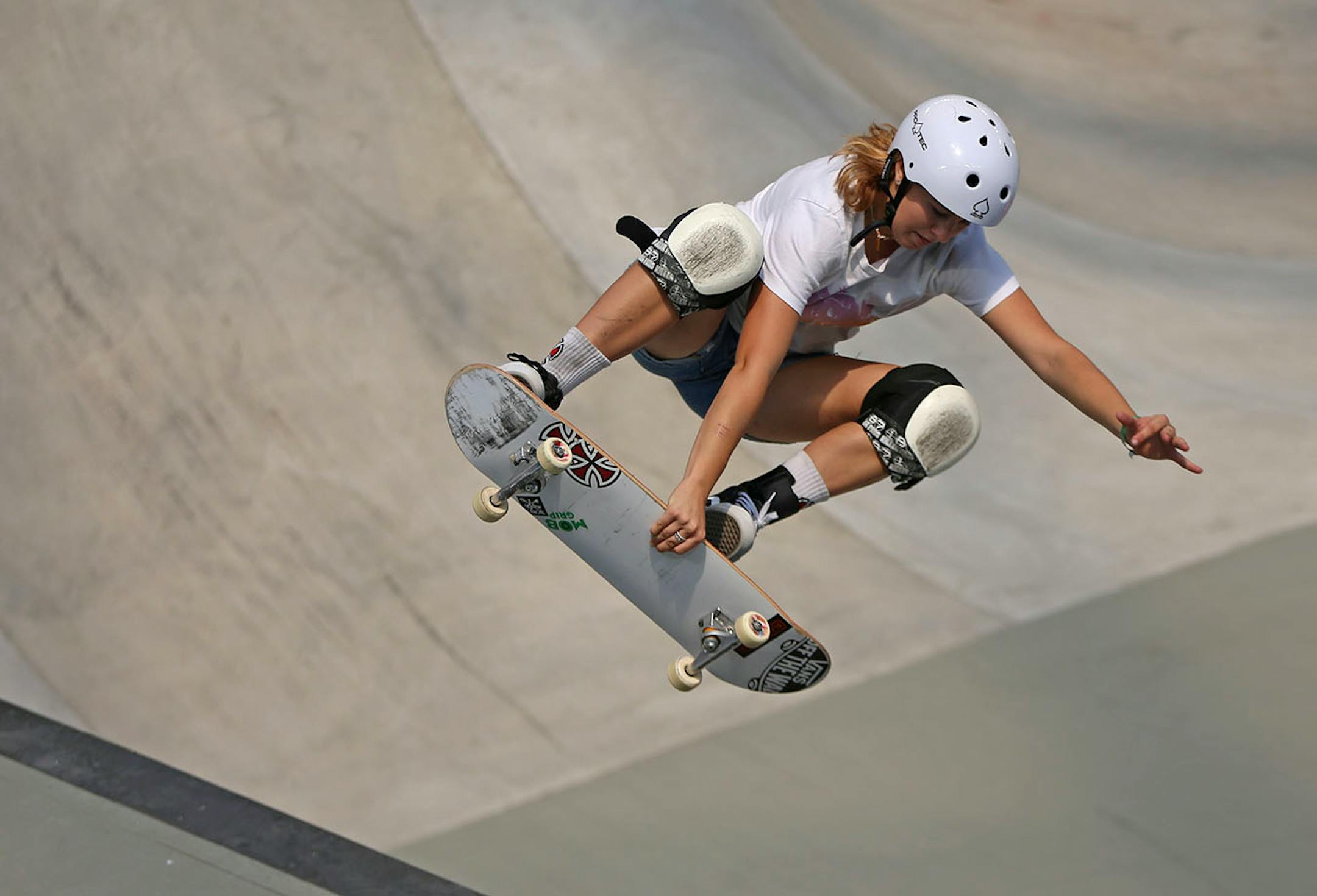 Jordyn Barratt catches some air during one of her runs in the final of the women's skateboard park.