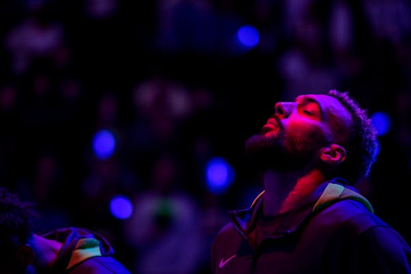 Rudy Gobert of the Minnesota Timberwolves during the National Anthem at the home opener Wednesday, October 19, 2022, at Target Center in Minneapolis, 