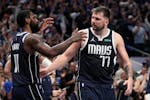 When it comes to closing out games, the Wolves are finding out, few do it better that Mavericks guards Kyrie Irving, left, and Luka Doncic.