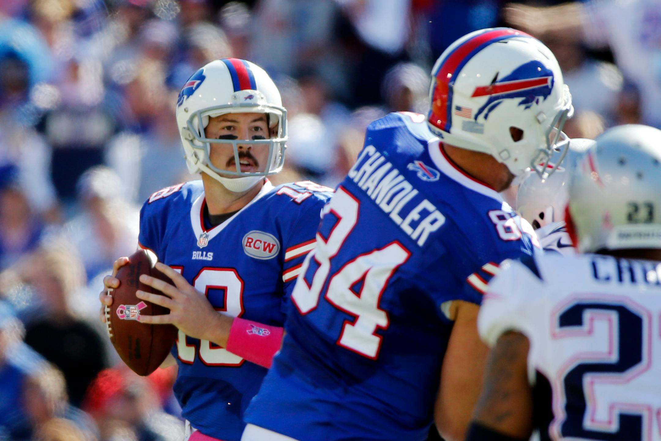 Buffalo Bills quarterback Kyle Orton (18) looks to pass during the first half of an NFL football game against the New England Patriots Sunday, Oct. 12, 2014, in Orchard Park, N.Y. (AP Photo/Mike Groll)