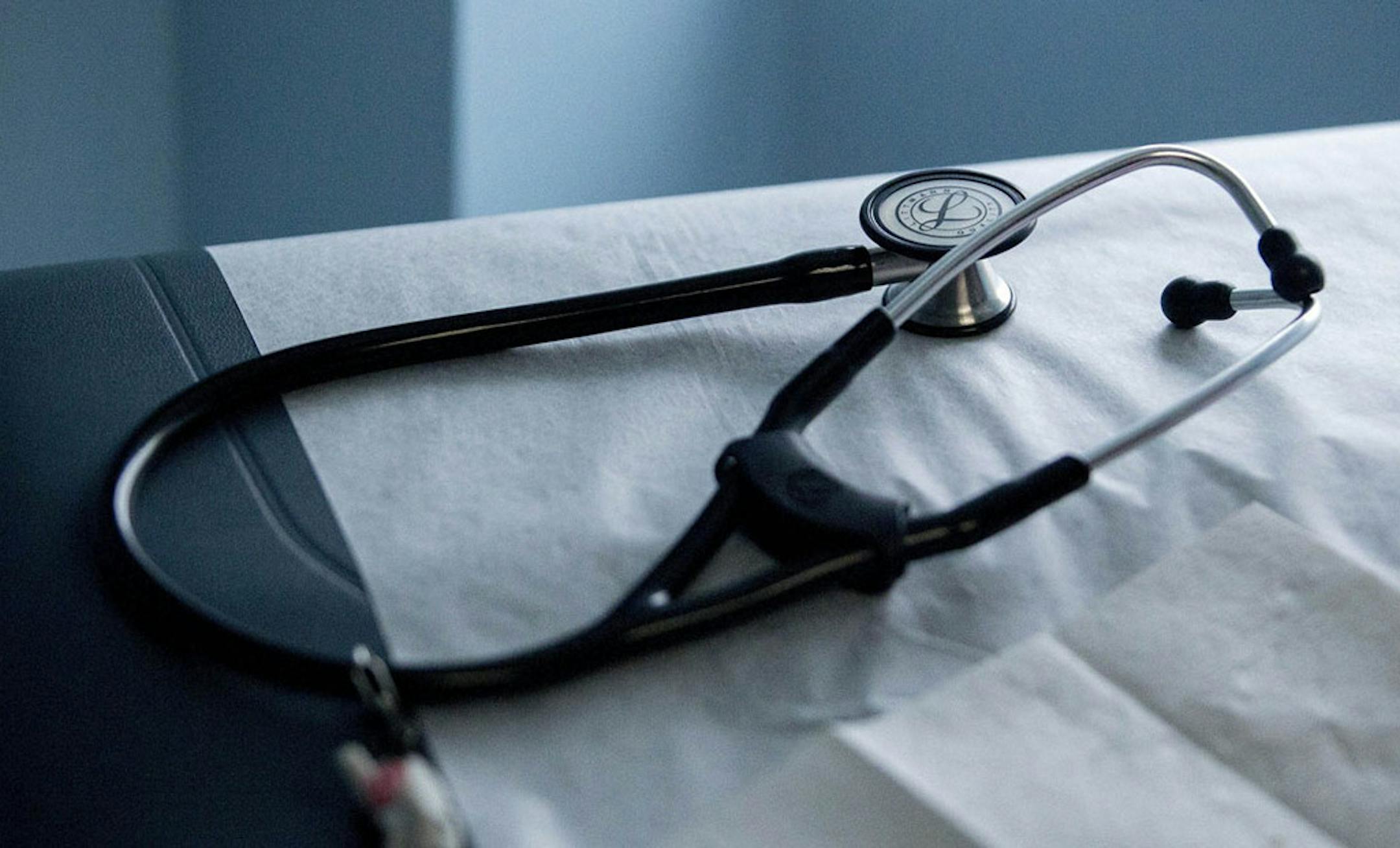 A stethoscope sits on an examination table in an exam room at a Community Clinic health center in Takoma Park, Md. MUST CREDIT: Bloomberg photo by Andrew Harrer ORG XMIT: 547405277