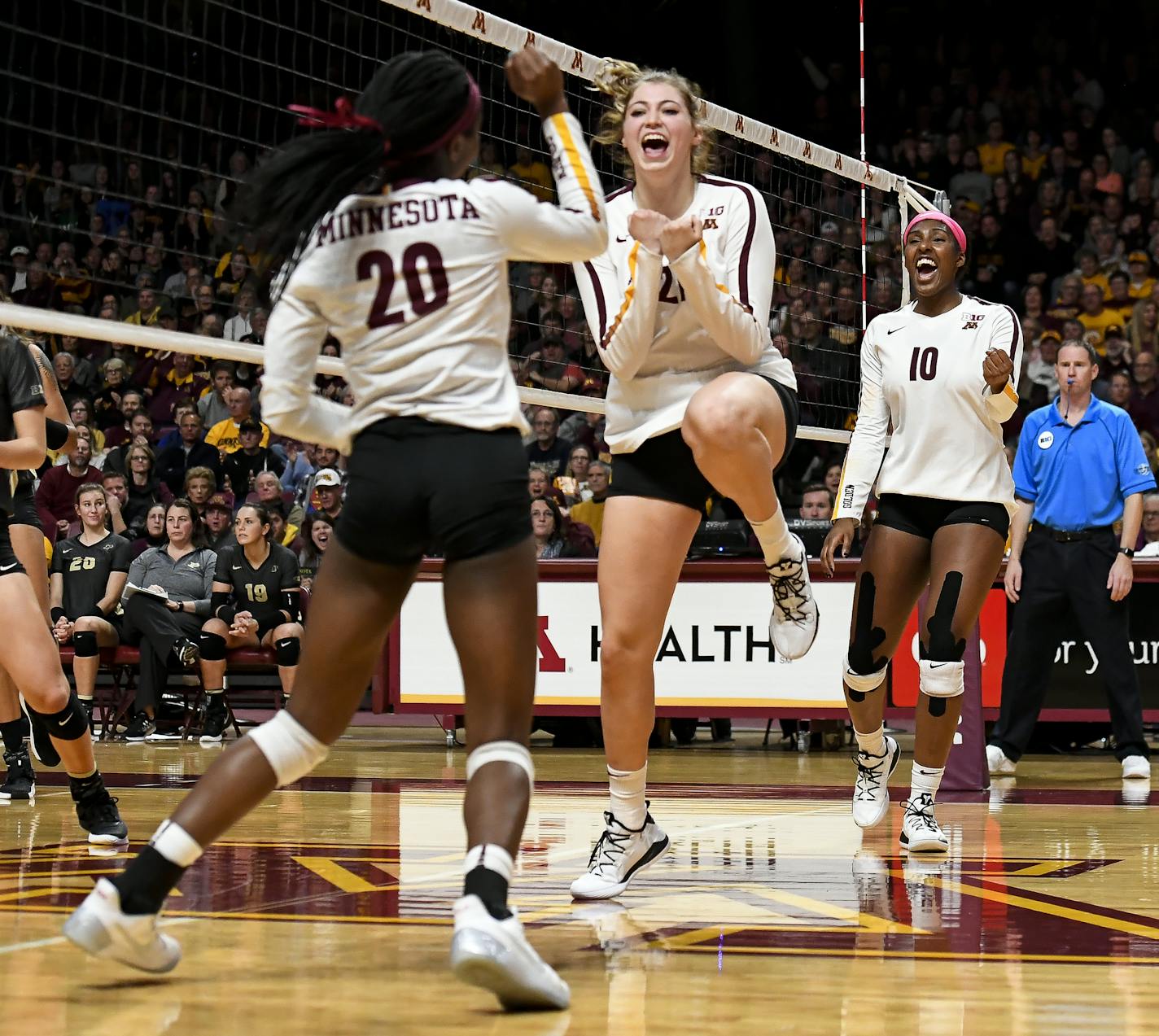 From left, Minnesota Golden Gophers outside hitter Adanna Rollins (20), middle blocker Regan Pittman (21) and right side hitter Stephanie Samedy (10) celebrated a point late in the third set as they closed in on a 3-0 victory over Purdue Saturday night. ] Aaron Lavinsky &#x2022; aaron.lavinsky@startribune.com The University of Minnesota Golden Gophers volleyball team played the Purdue Boilermakers on Saturday, Nov. 10, 2018 at the University of Minnesota Athletic Pavilion.