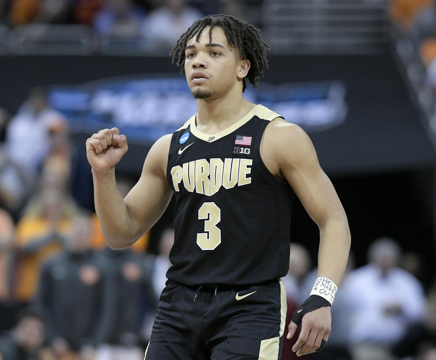 Purdue's Carsen Edwards reacts to a score during overtime of a men's NCAA Tournament college basketball South Regional semifinal game against Tennessee Thursday, March 28, 2019, in Louisville, Ky. Purdue won 99-94. (AP Photo/Timothy D. Easley)