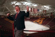 Al Shaver hammed it up for the cameras while broadcasting Gophers games in 1996.