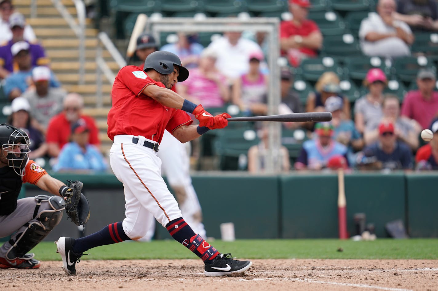 Minnesota Twins left fielder Eddie Rosario (20) connected with the ball during Monday's game against the Baltimore Orioles. ] ANTHONY SOUFFLE &#x2022; anthony.souffle@startribune.com The Minnesota Twins played a Spring Training Grapefruit League game against the Baltimore Orioles Monday, Feb. 25, 2019 at the CenturyLink Sports Complex's Hammond Stadium in Fort Myers, Fla.