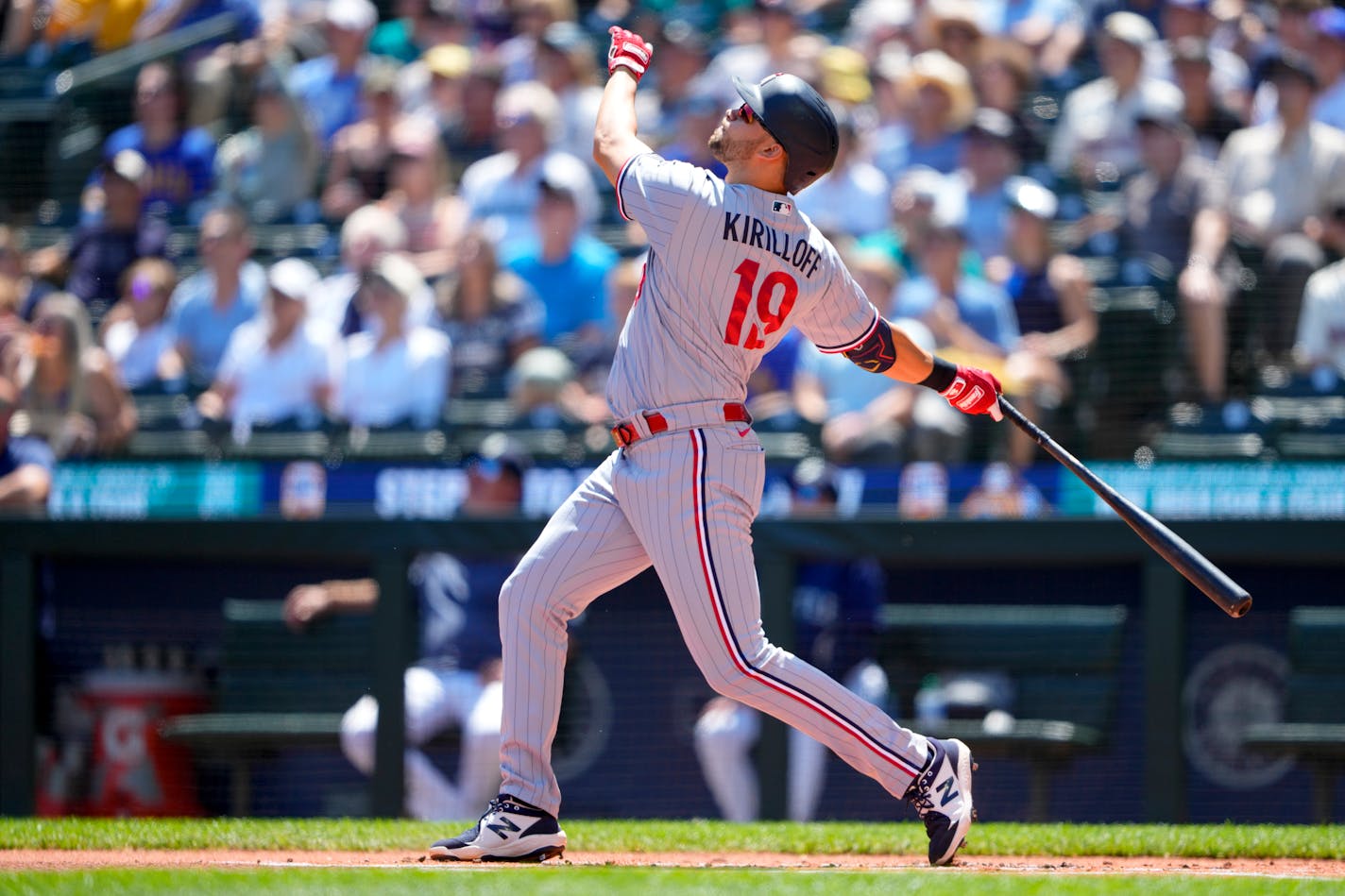 Minnesota Twins' Alex Kirilloff follows through during a baseball game against the Seattle Mariners, Thursday, July 20, 2023, in Seattle. (AP Photo/Lindsey Wasson)