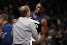 Wolves guard Jimmy Butler was congratulated by owner Glen Taylor on the court following Friday's victory over Oklahoma City.