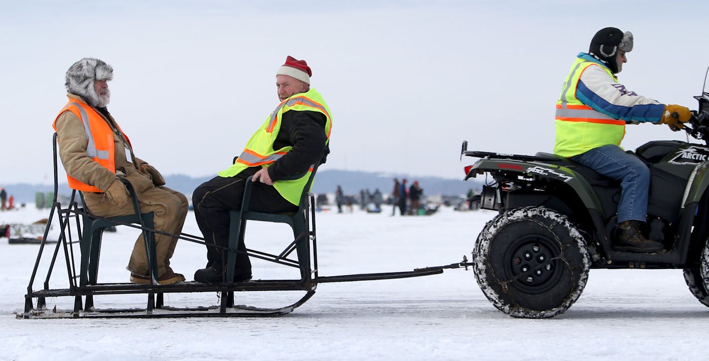 There were multiple modes of transportation across the frozen ice on Hole in the Day Bay of Gull Lake for the Ice Fishing Extravaganza Saturday, Feb. 6, 2016, in Brainerd, MN.](DAVID JOLES/STARTRIBUNE)djoles@startribune.com About 10,000 ice fishing contestants were expected to headed to Gull Lake north of Brainerd for the Brainerd Jaycees 26th Annual $150,000 Ice Fishing Extravaganza.