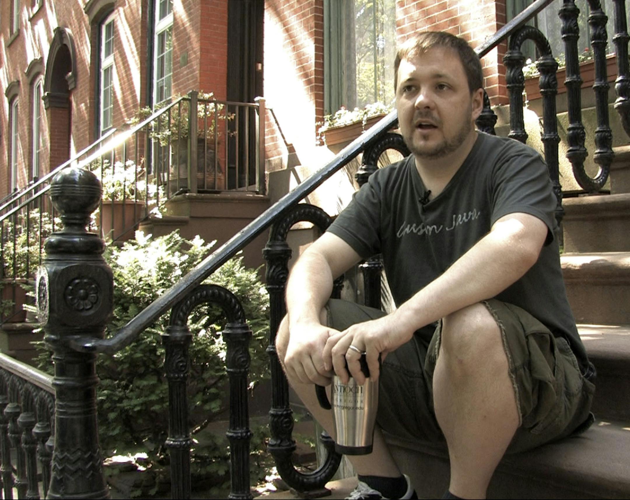 **ADVANCE FOR MONDAY JULY 23**FILE**Daniel McGowan sits on the steps at his home in the Brooklyn borough of New York, June 21, 2007. McGowan was sentenced in June to seven years in prison for arson by a federal judge in Eugene, ore., who heard a number of cases involving the activities of the radical Earth Liberation Front. (AP Photo/Rick Bowmer) ORG XMIT: NY314