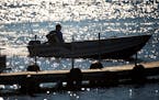 A fishing boat cruised on Wahkon Bay, Lake Mille Lacs in the afternoon sun in the city of Wahkon, MN ] Thursday, May 22, 2014 GLEN STUBBE * gstubbe@st